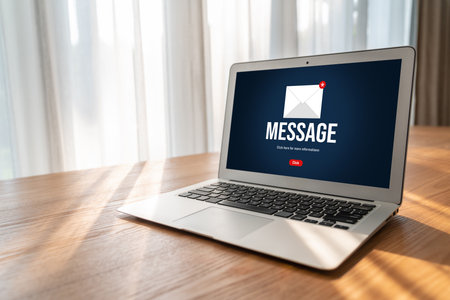 Email notification message showing on computer screen snugly. Digital marketing message information text from business to customer clientの写真素材