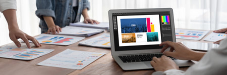 Graphic designer software for modern design of web page and commercial brisk ads showing on the...