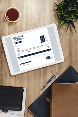 Invoice on computer screen from accounting application. Computer program for financial and budget of corporate business. Snugly.の写真素材