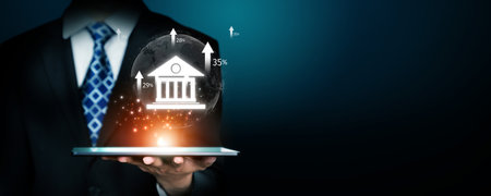Business person transforms online banking, employing tech for innovative finance solutions. Streamlining banking and finance processes, Technology elevates online banking to new heights. FaaSの写真素材