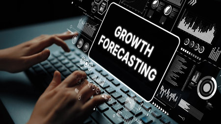 Futuristic Digital Interface Displaying Growth Forecasting Data with Hands Typing on Keyboard. Asymptotic smart data analytic.の写真素材