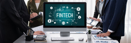 Panorama shot analyst team utilizing BI Fintech to analyze financial report with laptop. Businesspeople analyzing BI data dashboard displayed on laptop screen for business insight. Prodigyの写真素材