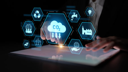 Carbon reduction at the center of sustainable strategies, including renewable energy, recycling, clean water, innovation, global responsibility, and eco-friendly industryの写真素材