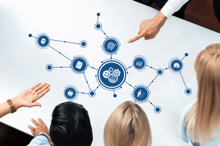 A focused business team engages in a strategic discussion about key performance indicators displayed...