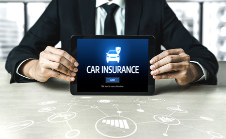 car insurance online website on computer screen for insure your car damage snuglyの写真素材
