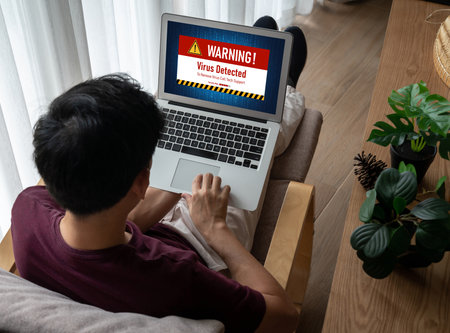 Virus warning alert on computer screen detected modish cyber threat , hacker, computer virus and malwareの写真素材