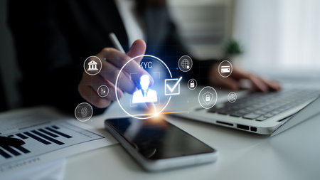 Digital KYC verification with biometric scan, ID authentication, and financial security icons representing identity verification, secure onboarding, fraud prevention, and complianceの写真素材