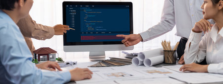 Group of interior architect designer discussing together on blueprint and laptop screen display...
