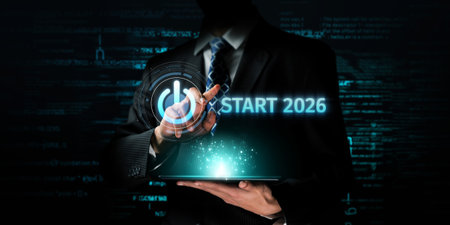 A businessman interacts with a digital start button, symbolizing the launch of new goals and...