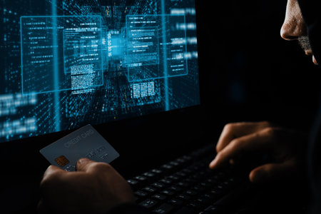 Criminal anonymous male approaching credit card of personal information database for codding...