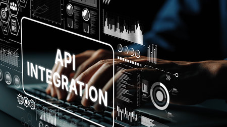 Hands Typing on Keyboard with API Integration Data Visualization and Statistics in Background for...