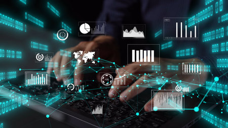 Engaging image of hands typing on a digital keyboard overlaid with graphs and charts, symbolizing...