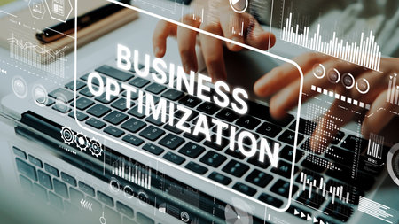 Business Optimization Concept with Data Analytics Visuals and Hands Typing on Laptop Keyboard....