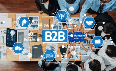 A diverse business team collaborates on B2B strategies at a conference table, exploring agreements...