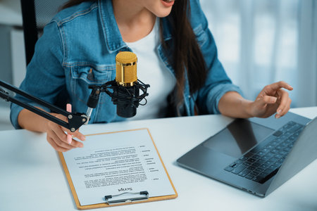 Host channel Asian influencer talking in broadcast streaming online wearing headset on social media...