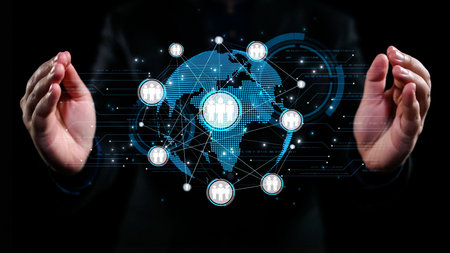 Hands are holding a digital representation of a global network, showcasing interconnected people...