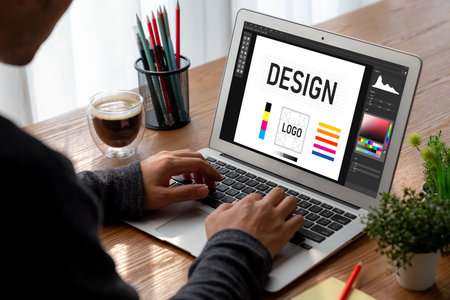 Graphic designer software for modern design of web page and commercial ads showing on the computer...