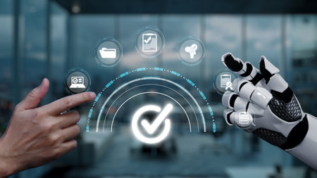 A human hand interacts with a robotic hand, showcasing a seamless connection in data management,...