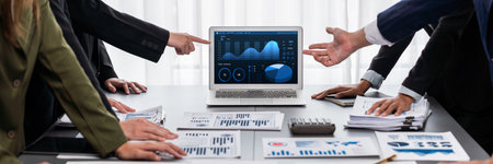 Panorama shot analyst team utilizing BI Fintech to analyze financial report with laptop....