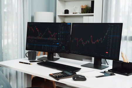 Two screens of dynamic stock market exchange graph showing on computer. Automatically trading sell or buy profit on time application investment on financial technology updated on software. Infobahn.の写真素材