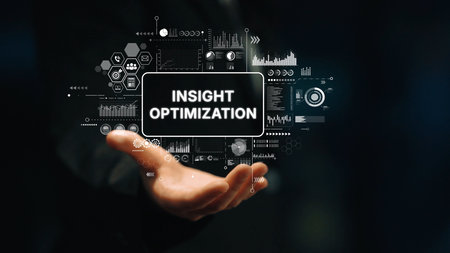 Hand Holding Digital Interface with Insight Optimization Concept and Analytics Visuals in Dark...