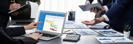 Project planning software for brisk business project management on the computer screen showing...