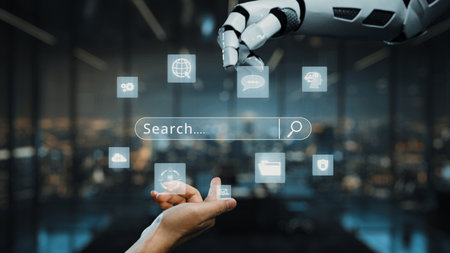 A sleek robotic hand reaches out to digital icons, showcasing an interactive interface in a futuristic setting. The image represents the integration of advanced technology and automation.の写真素材