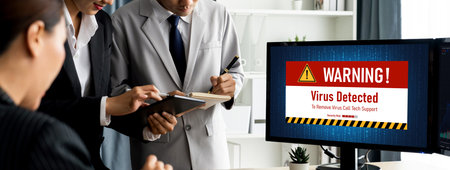 Virus warning alert on computer screen detected brisk cyber threat , hacker, computer virus and...