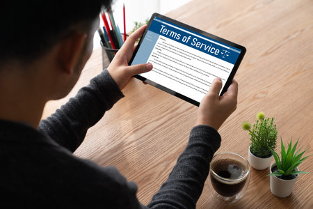 Online term of service conditions showing brisk rules and regulations in using the website on device screen for users to make an agreement to the online term of serviceの写真素材