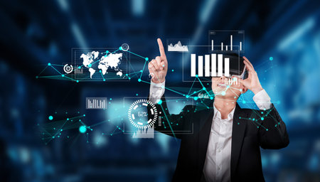 A business professional engages with virtual reality technology, analyzing financial data using...