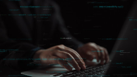 A detailed close-up image showcasing hands typing on a laptop keyboard surrounded by code overlays,...