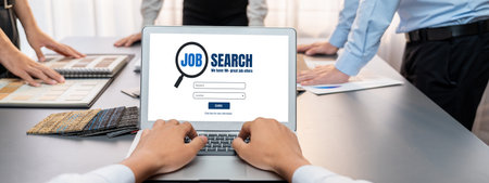 Group of interior architect designer team at table choosing various mood board samples with architecture software on laptop screen. Modern renovation and interior material selection concept. Insightの写真素材