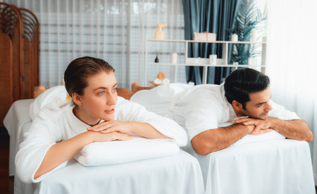Caucasian couple customer enjoying relaxing anti-stress spa massage and pampering with beauty skin...