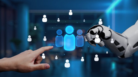 A visually striking image depicting a human hand and a robotic arm interacting with glowing user...