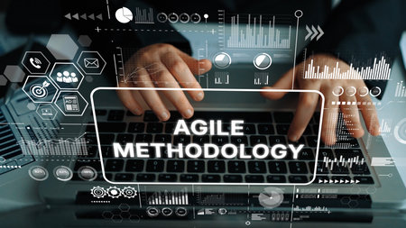 Hands Typing on Laptop with Graphic Overlay of Agile Methodology and Digital Data Analytics Concepts. Asymptotic smart data analytic.の写真素材