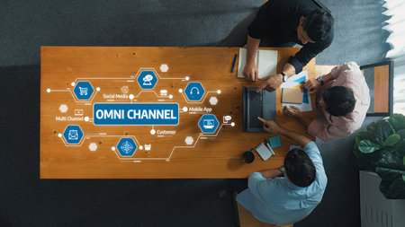 Explore the dynamic environment of omni channel strategies where teams collaborate on integrating social media and mobile applications to enhance customer engagement and experience. Amityの写真素材