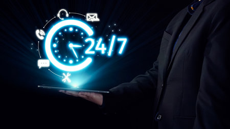A professional person holding a tablet displays a glowing 24 hour service availability concept,...