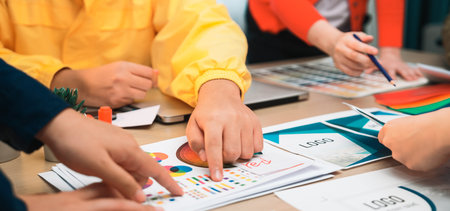 A dynamic team engages in a creative brainstorming session, collaborating on design concepts and...