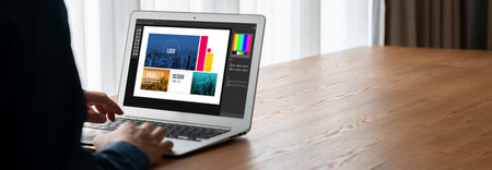 Graphic designer software for modern design of web page and commercial ads showing on the computer screenの写真素材