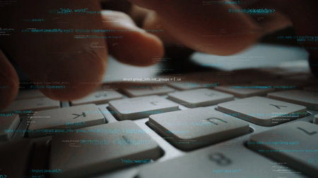 A close-up image showcasing hands typing on a keyboard, surrounded by digital code and data. This...