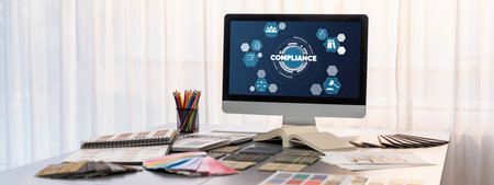 Interior designer workspace table and architecture software on laptop screen with mood board materials and colorful swatch color for color selection. Modern interior design office. Insightの写真素材