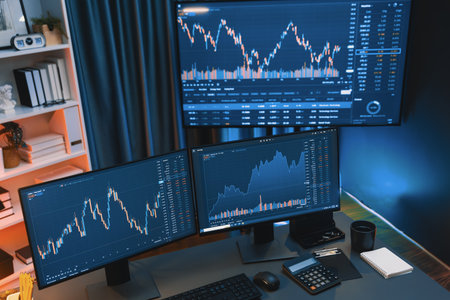 Big screens of dynamic stock market exchange graph showing on computer at neon light night time....