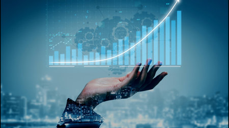 A creative representation of data analysis featuring a hand supporting a growth chart with digital...