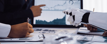 A business meeting scene with a human and robot analyzing data together. The atmosphere highlights...
