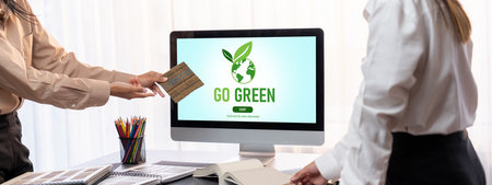 Group of interior architect designer team at table choosing various mood board samples with architecture software on laptop screen. Modern renovation and interior material selection concept. Insightの写真素材