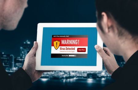 Virus warning alert on computer screen detected modish cyber threat , hacker, computer virus and...