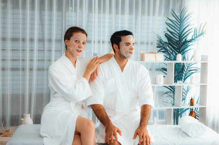 Serene modern daylight ambiance of spa salon, couple customer indulges in rejuvenating with facial...