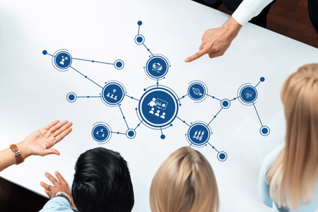 This image showcases a diverse group engaged in a collaborative discussion, analyzing visual data...