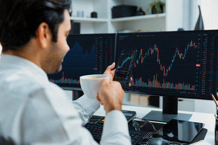 Trader businessman holding coffee cup focusing on dynamic on phone, stock exchange investment screen...
