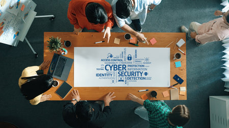 A group of professionals engaged in a brainstorming session on cyber security strategies, focusing...